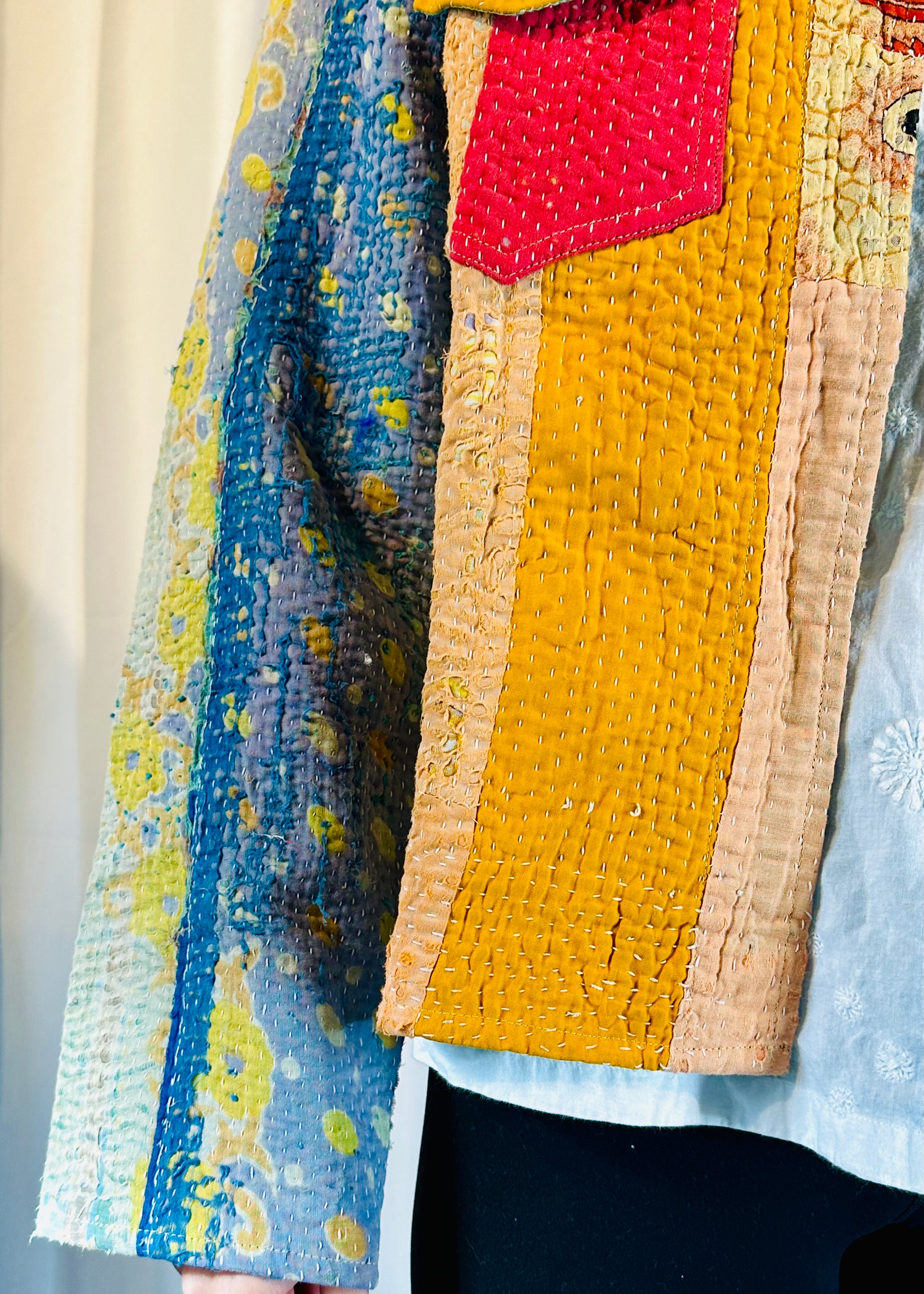 Sustainably Crafted Unique Quilted Trucker Jacket in Vibrant Orange, Red, and Blue from Recycled Saris - DharBazaar